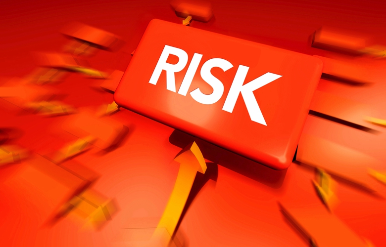 The word risk in white jumping out of a bright red background